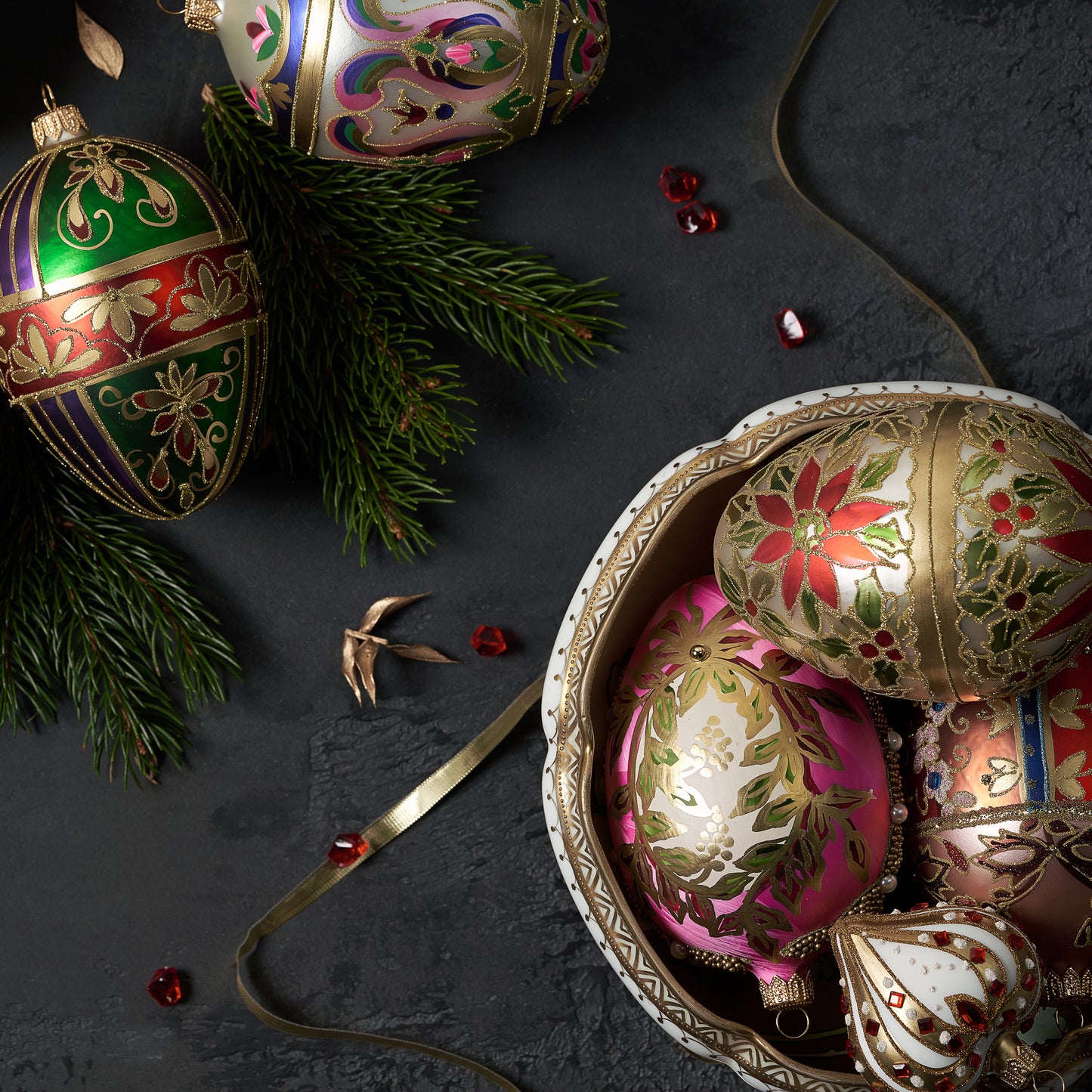 GOLD FABERGÉ EGG WITH RED POINSETTIA PATTERN